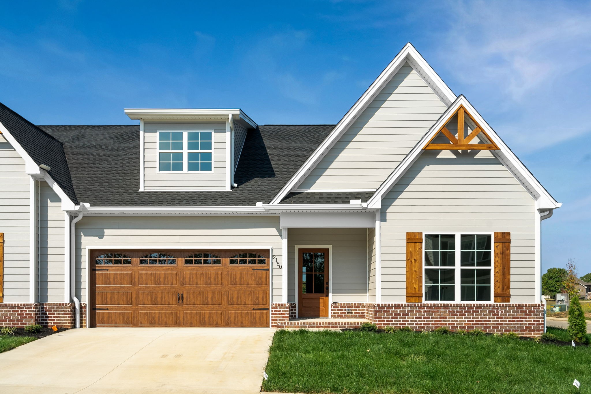 front view of a house with a yard