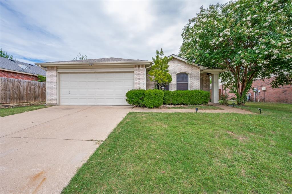 8405 Seven Oaks Lane Denton, TX 76210 - Photo 1 of 11 a front view of house with yard and green space