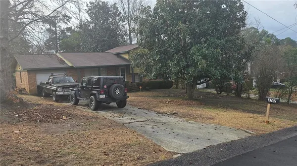a view of a backyard of a house