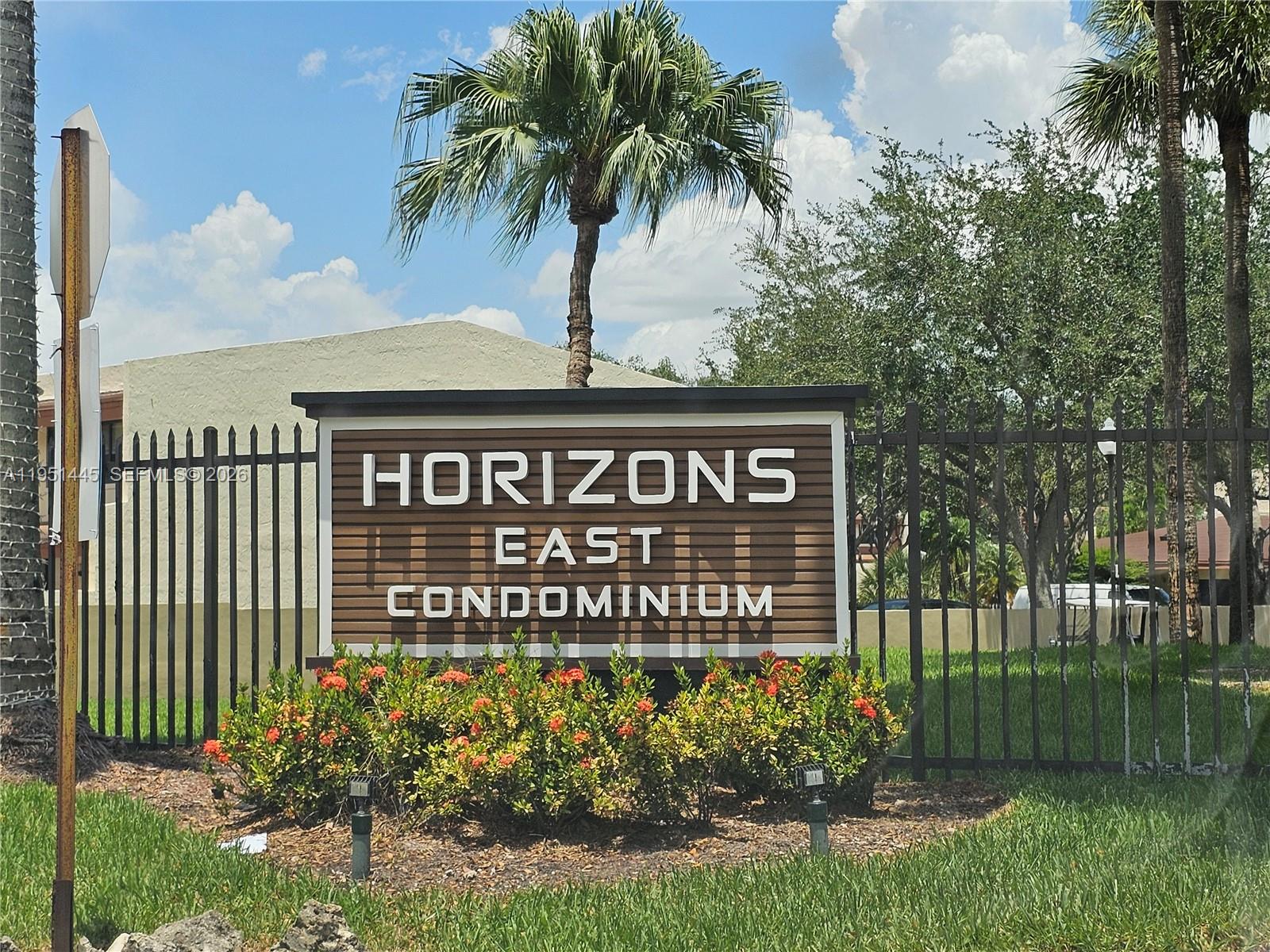 8075 Southwest 107th Avenue, Unit 114 Miami, FL 33173 - Photo 2 of 18 a sign on the side of a building