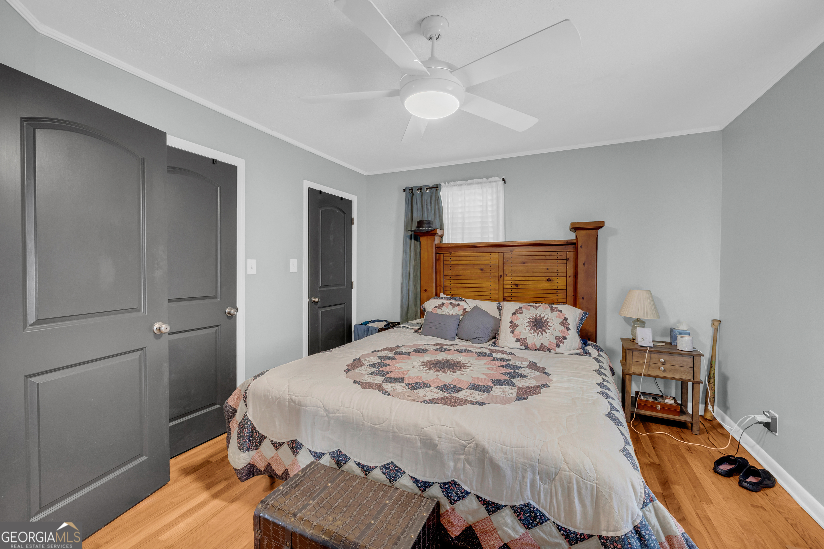 136 Frazier Hill Road Bishop, GA 30621 - Photo 36 of 59 a bedroom with a bed and a table in it