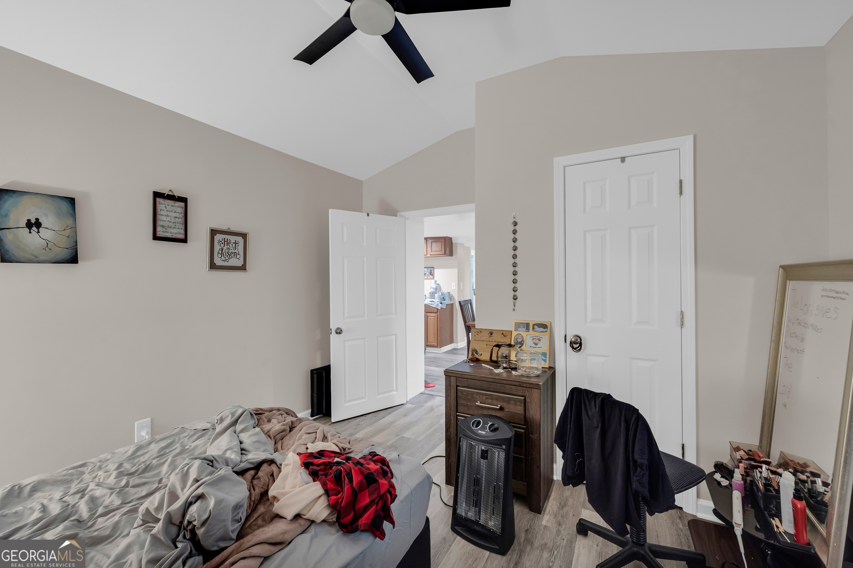 136 Frazier Hill Road Bishop, GA 30621 - Photo 52 of 59 a bedroom with a bed and a window