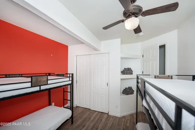 a view of a kitchen with a stove cabinets and wooden floor
