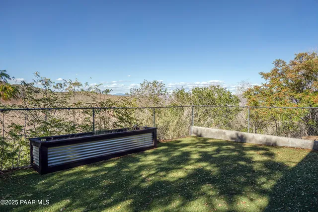 a view of a bench in the middle of a lake