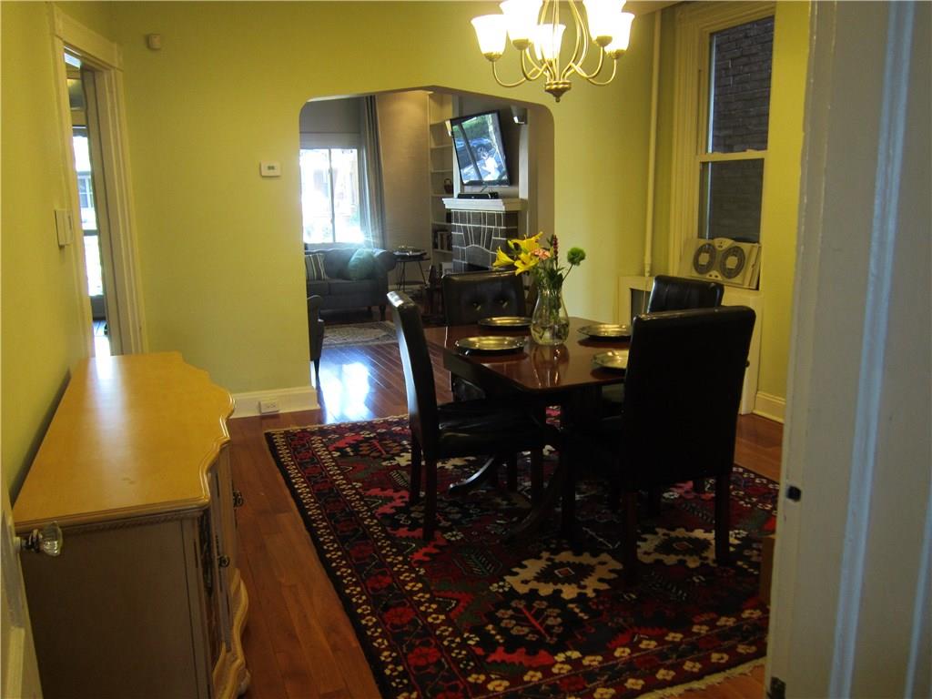 214 South Mathilda Street Friendship Park, PA 15224 - Photo 6 of 25 Dining room and view of the living room.