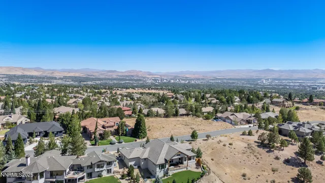 a view of a city with mountains in the background