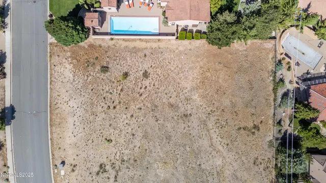 a view of a city with mountains in the background