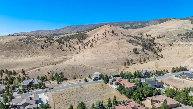 a view of a road with a mountain in the background