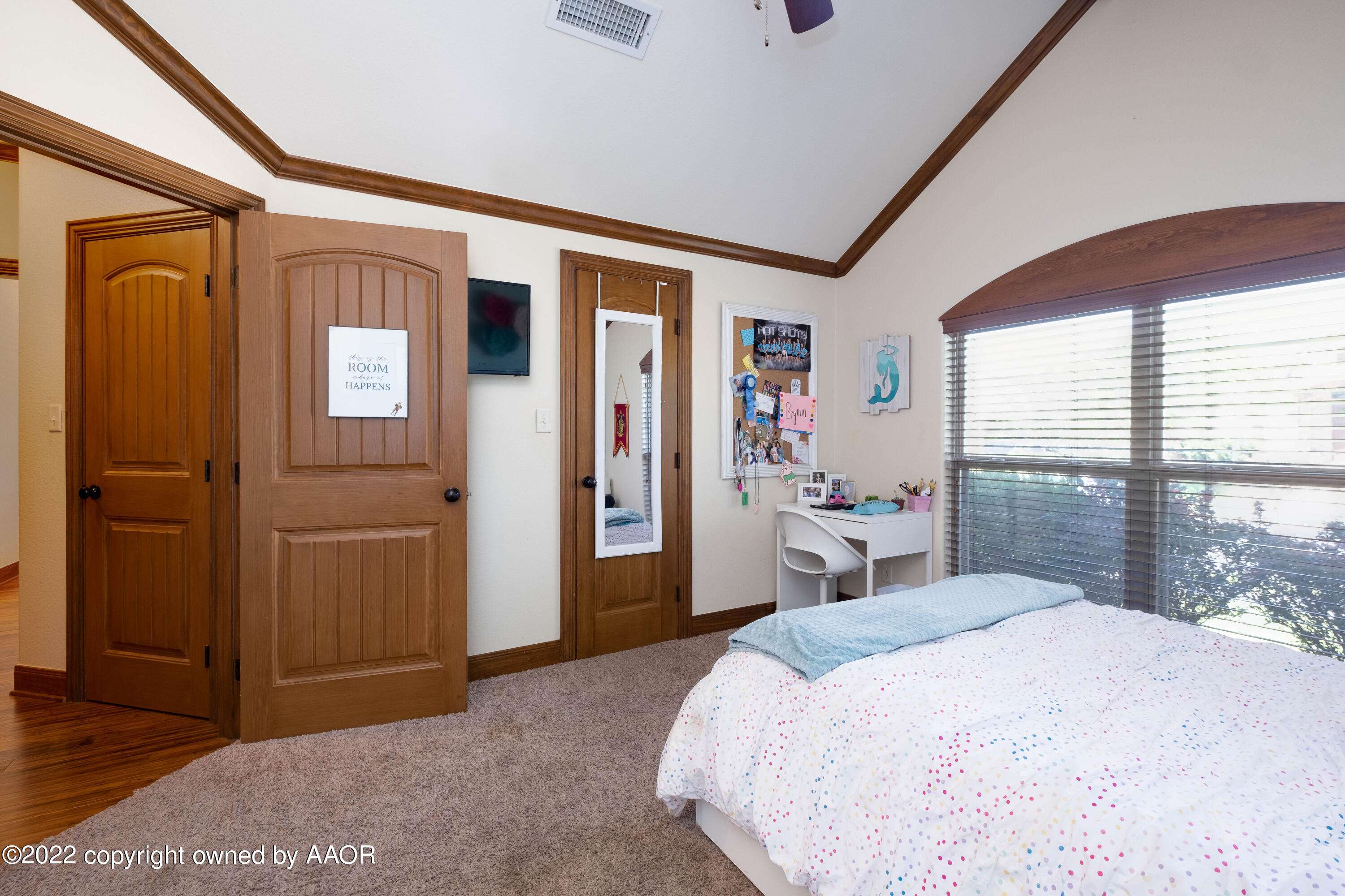 8417 Hamilton Drive Amarillo, TX 79119 - Photo 18 of 42 a bedroom with a large bed and a window