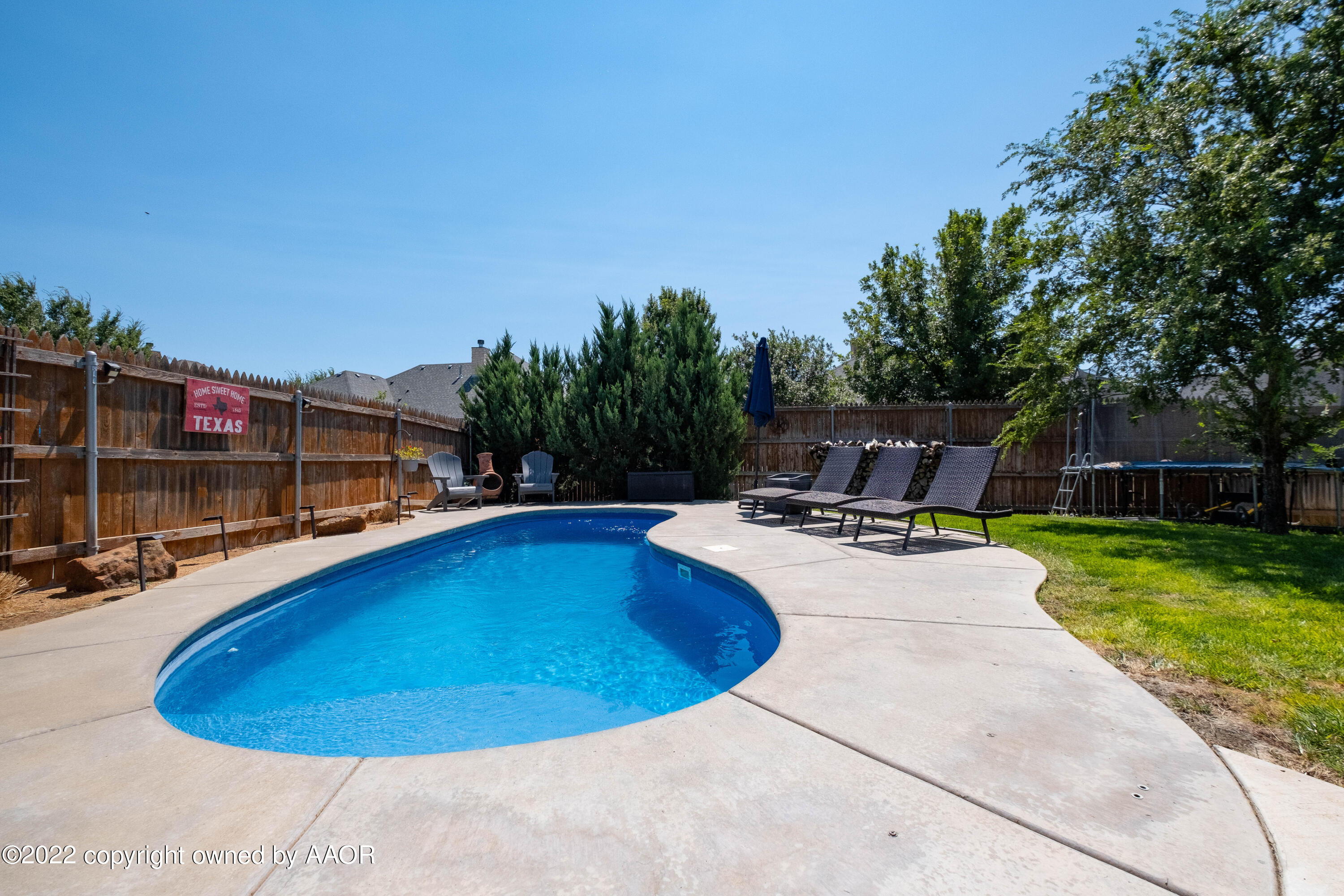 8417 Hamilton Drive Amarillo, TX 79119 - Photo 38 of 42 a view of a swimming pool with a patio