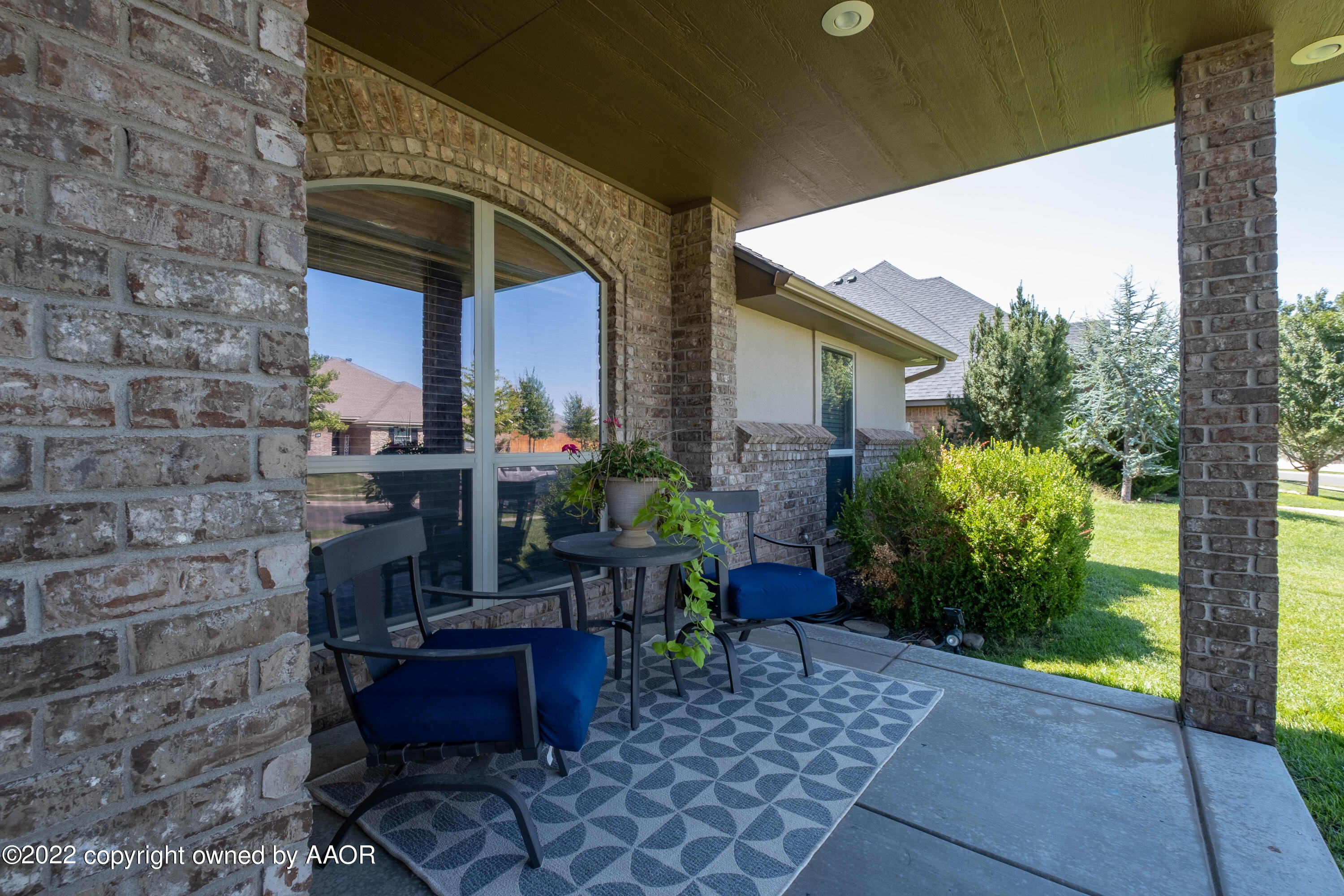 8417 Hamilton Drive Amarillo, TX 79119 - Photo 5 of 42 a view of a patio with chairs and potted plants