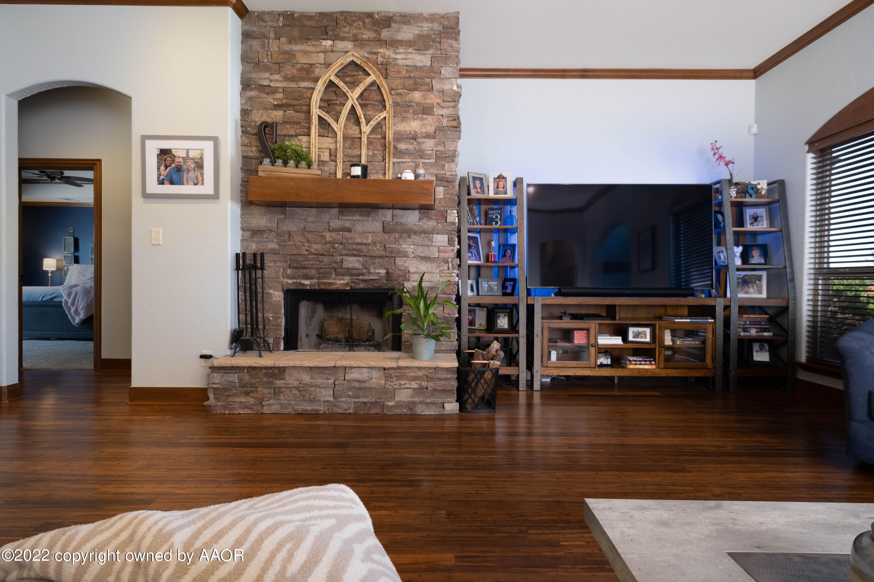 8417 Hamilton Drive Amarillo, TX 79119 - Photo 9 of 42 a living room with furniture and a flat screen tv