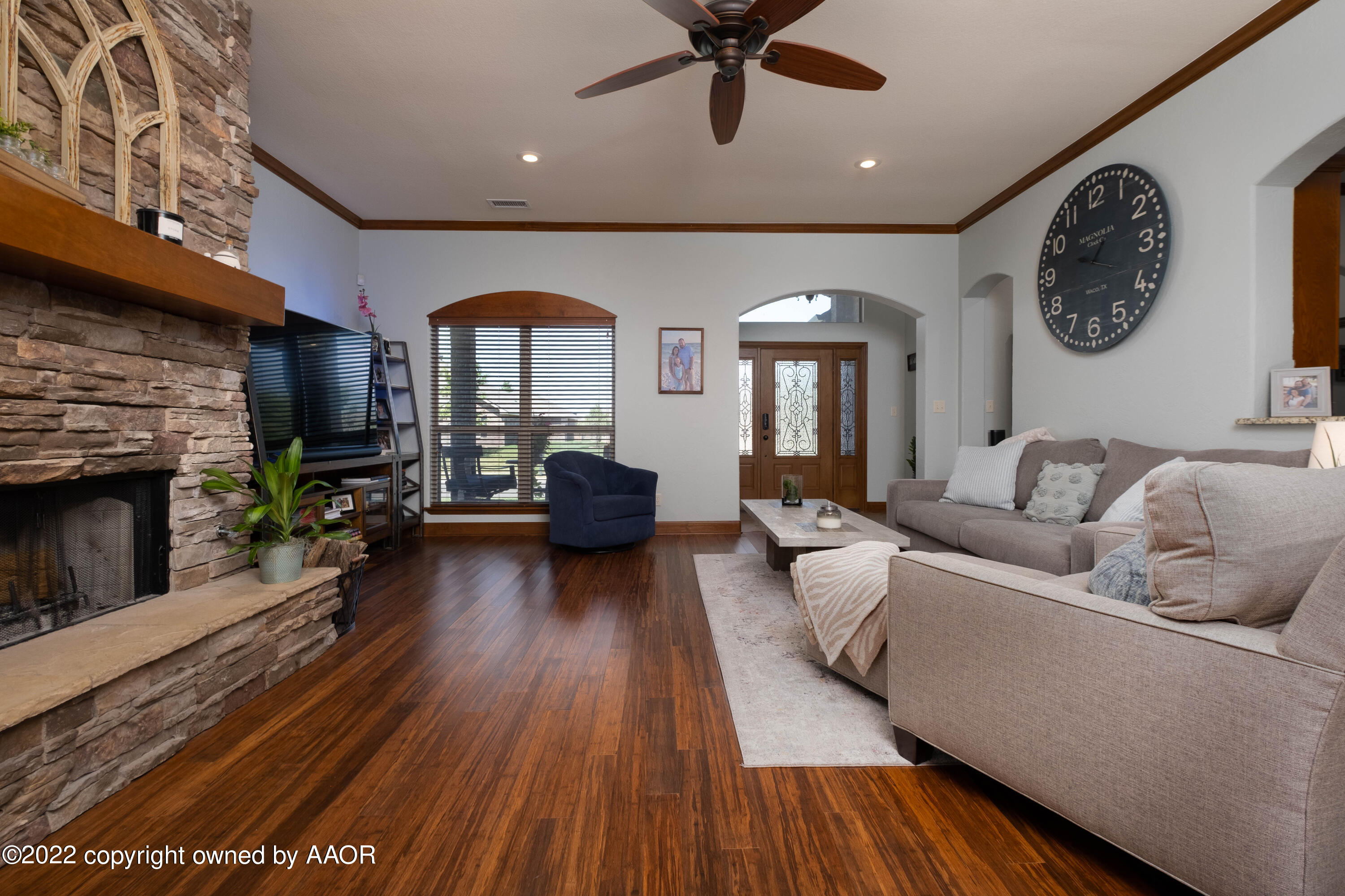 8417 Hamilton Drive Amarillo, TX 79119 - Photo 10 of 42 a living room with furniture and a fireplace