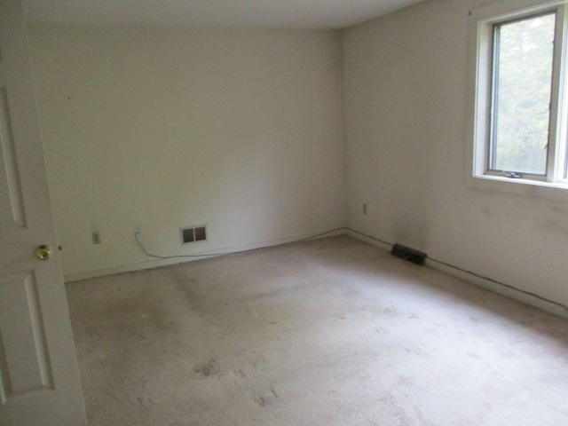4 Shellback Way, Unit A Mashpee, MA 02649 - Photo 13 of 16 an empty room with a window