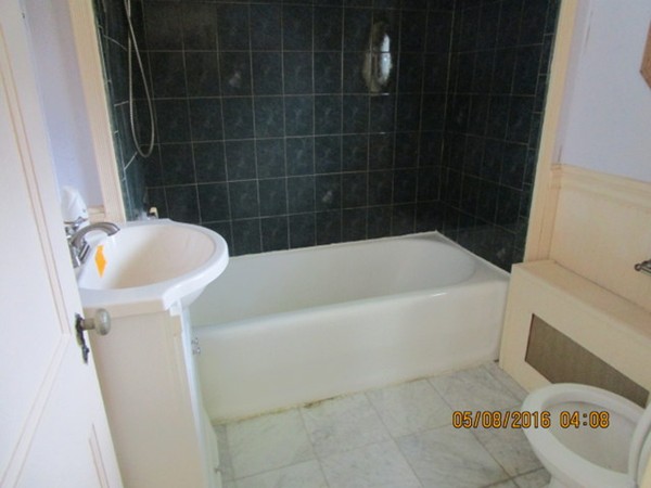 18 Marwood Road Worcester, MA 01602 - Photo 29 of 30 a white bath tub sitting next to a white sink