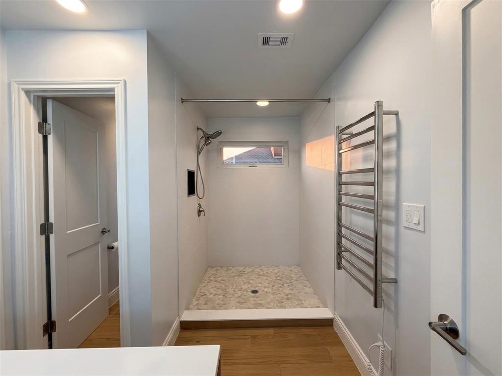 6524 Pheasant Run Road Plano, TX 75023 - Photo 33 of 40 TALL LIGHTED MIRROR & TALL CABINETS, DEEP SHOWER, TOWLET WARMER & SEPARATE CLOSET DOOR TOILET ROOM