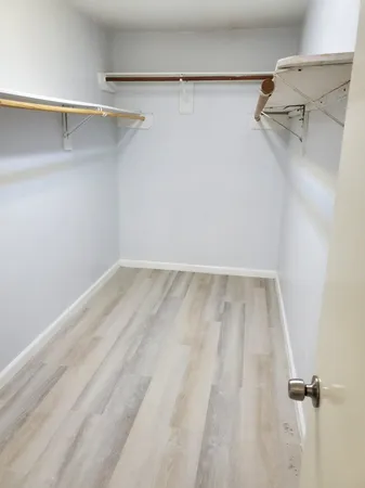 a view of a room with racks on the wall