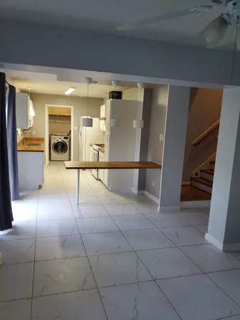 a view of a hallway with entryway