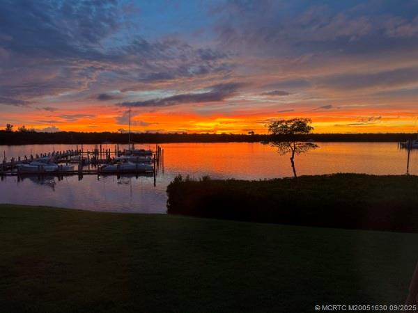 3100 Southeast Pruitt Road, Unit E204 Port St. Lucie, FL 34952 - Photo 3 of 40 a view of ocean from next to lake