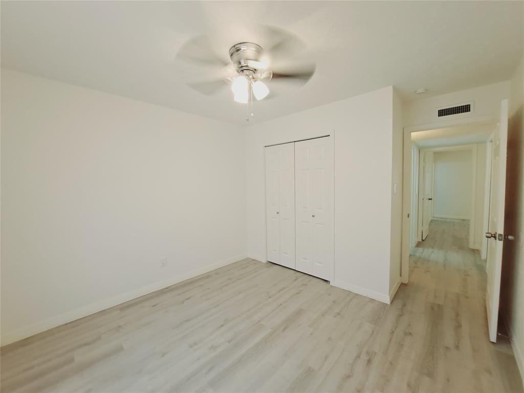 627 Valley View Drive Allen, TX 75002 - Photo 12 of 22 wooden floor in an empty room