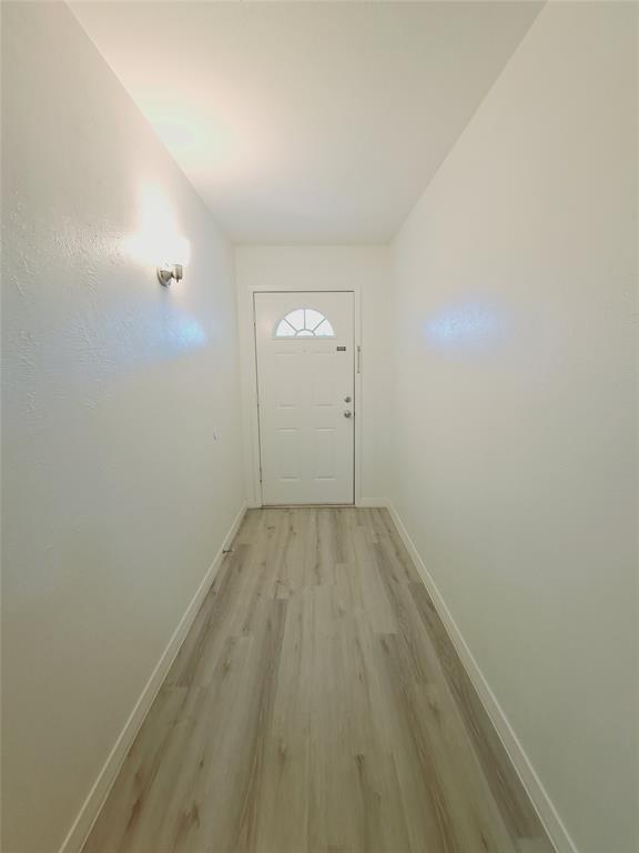 627 Valley View Drive Allen, TX 75002 - Photo 3 of 22 wooden floor in a empty room