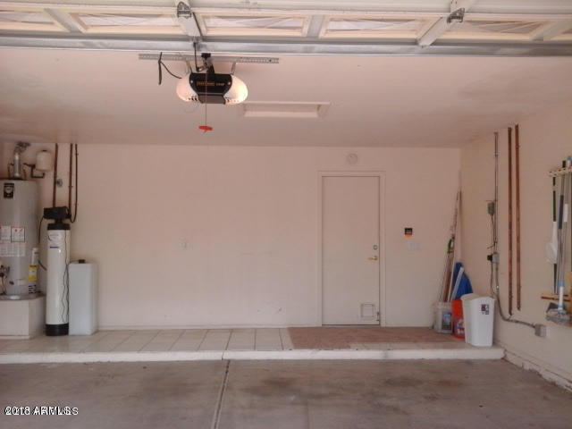 4306 East St John Road Phoenix, AZ 85032 - Photo 32 of 37 Water heater and softener in garage