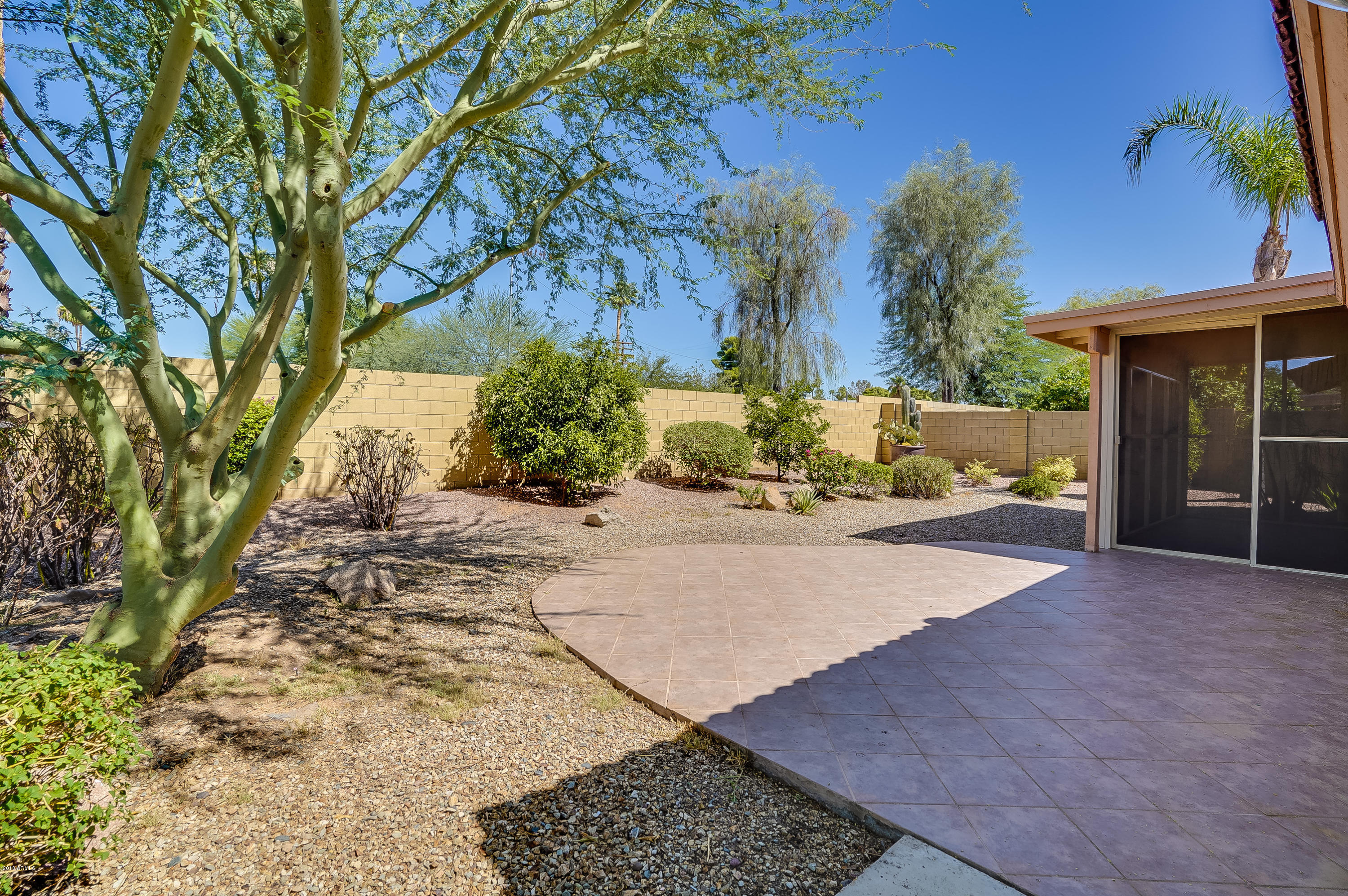 4306 East St John Road Phoenix, AZ 85032 - Photo 36 of 37 Extended and tiled patio