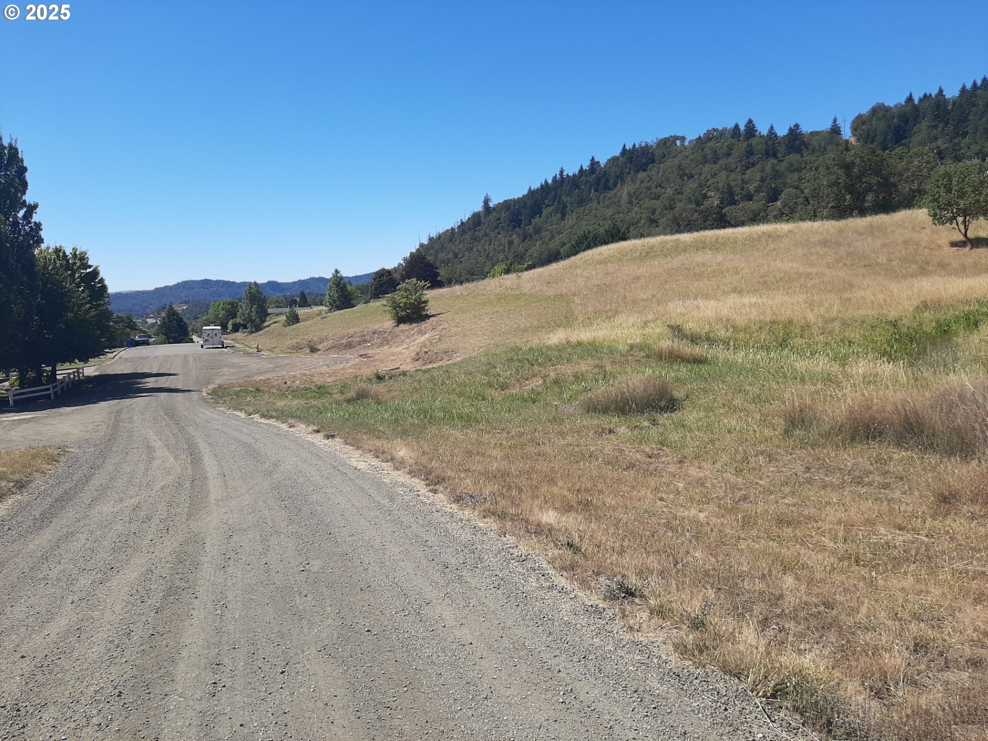 0 Northwest Broad Street Roseburg, OR 97471 - Photo 11 of 13 a view of a road with a yard
