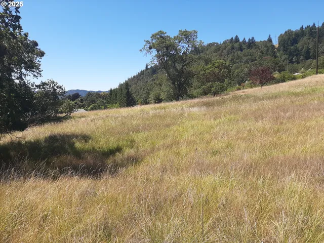 a view of mountain view with mountains in the background