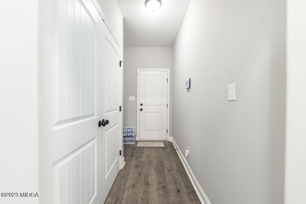 129 Timber Ridge Circle Byron, GA 31008 - Photo 20 of 42 a view of a hallway with wooden floor