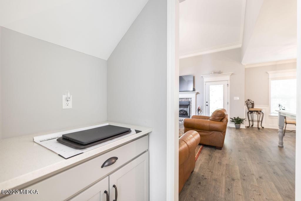 129 Timber Ridge Circle Byron, GA 31008 - Photo 28 of 42 a living room with furniture and a wooden floor