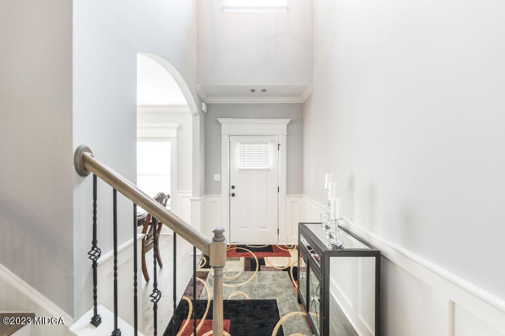 129 Timber Ridge Circle Byron, GA 31008 - Photo 7 of 42 a view of a hallway with wooden floor and entryway