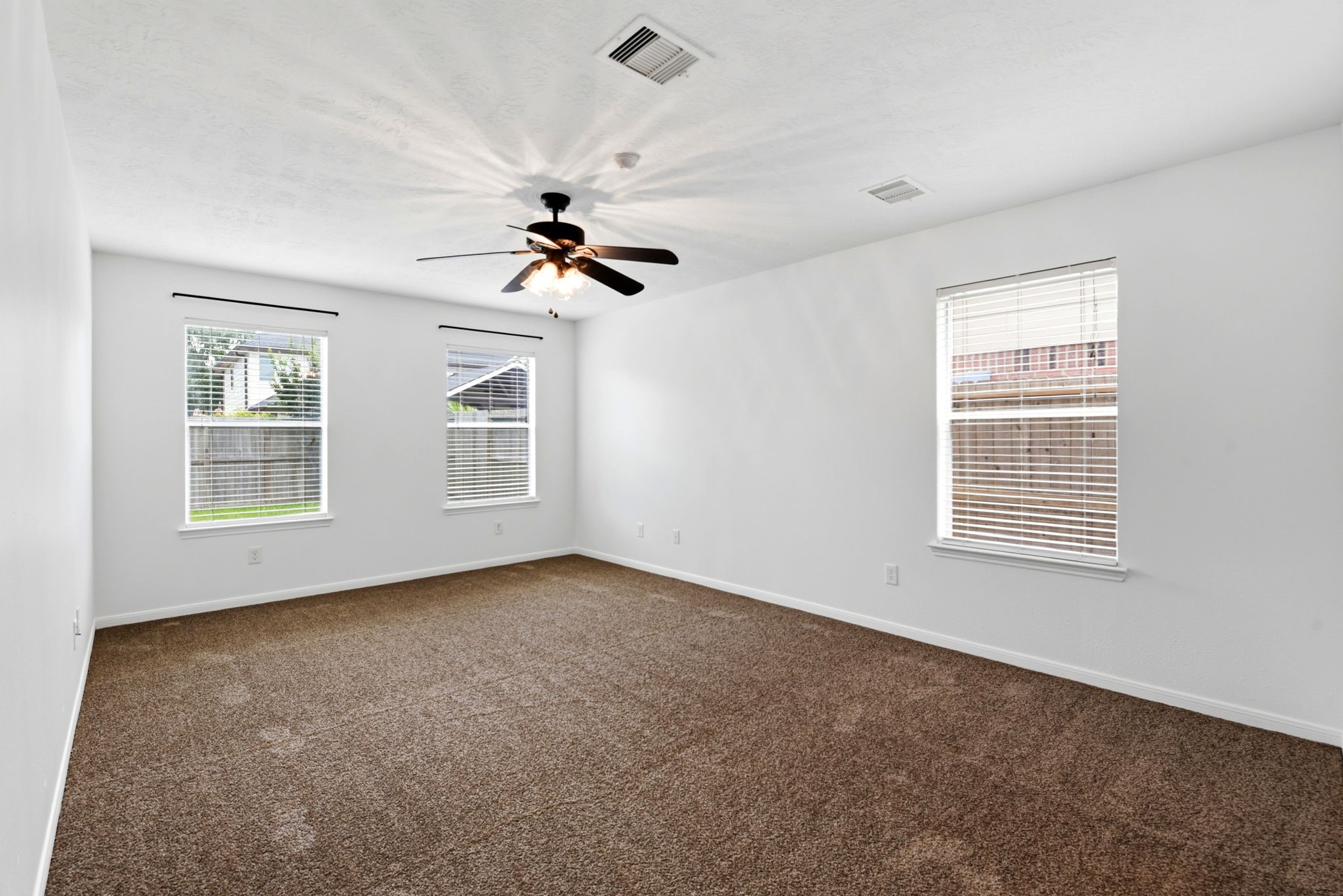 22102 Bridgestone Crossing Drive Spring, TX 77388 - Photo 16 of 38 a view of an empty room with a window