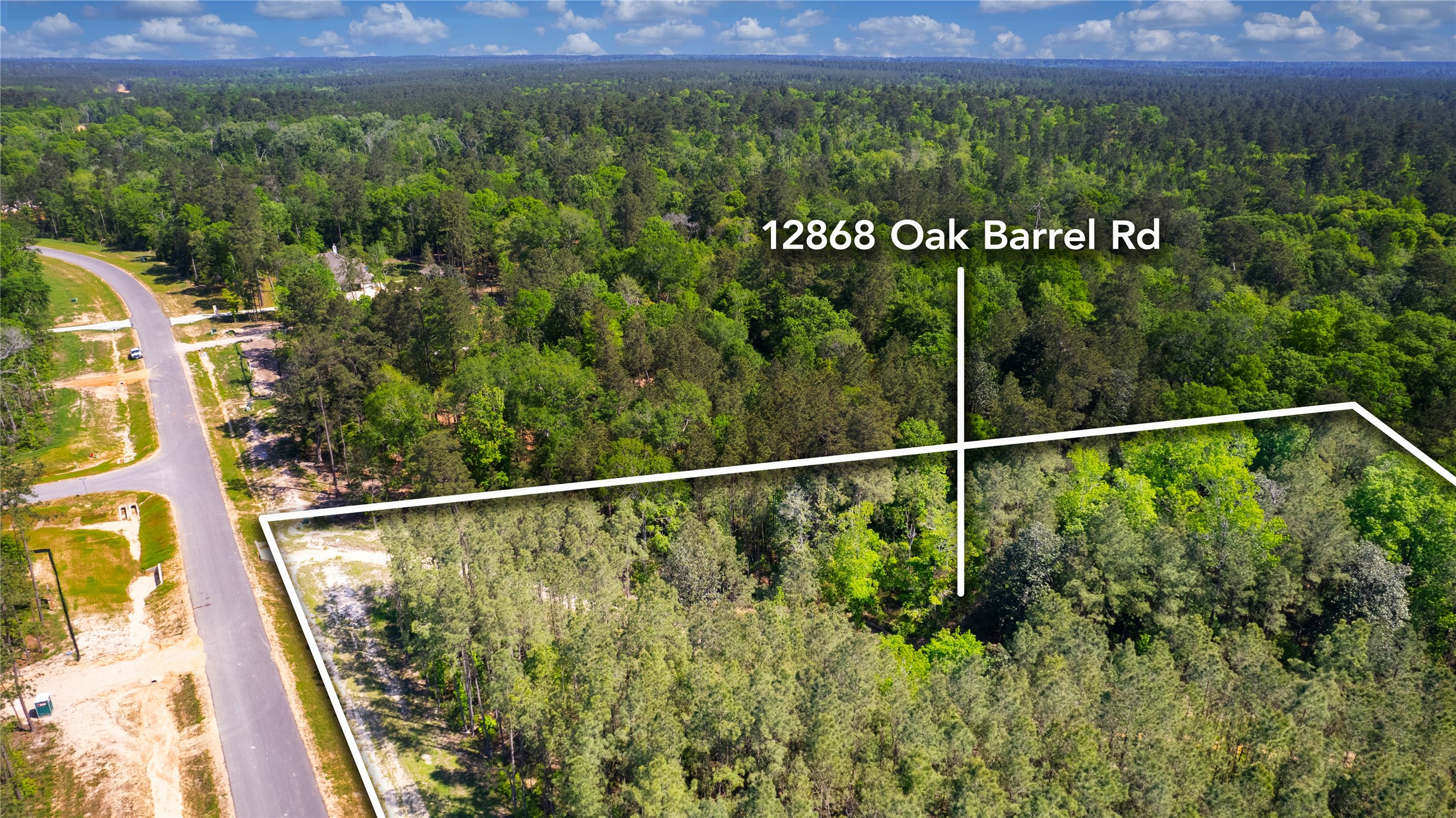 12868 Oak Barrel Road Willis, TX 77378 - Photo 28 of 32 a view of a lush green field