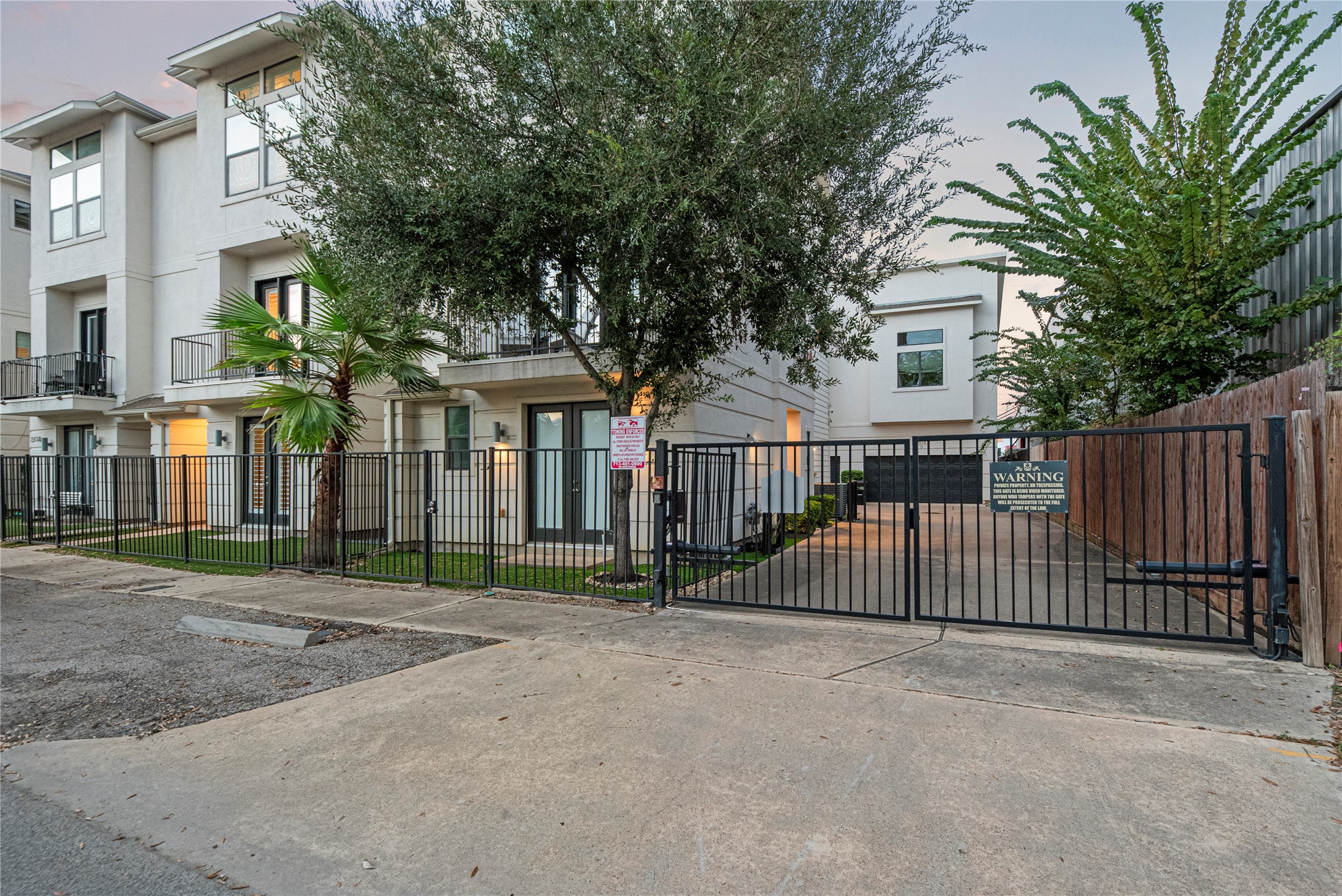2513 B Garrow Street Houston, TX 77003 - Photo 4 of 29 Gated driveway to the garages. There is also parking directly in front of the townhome.