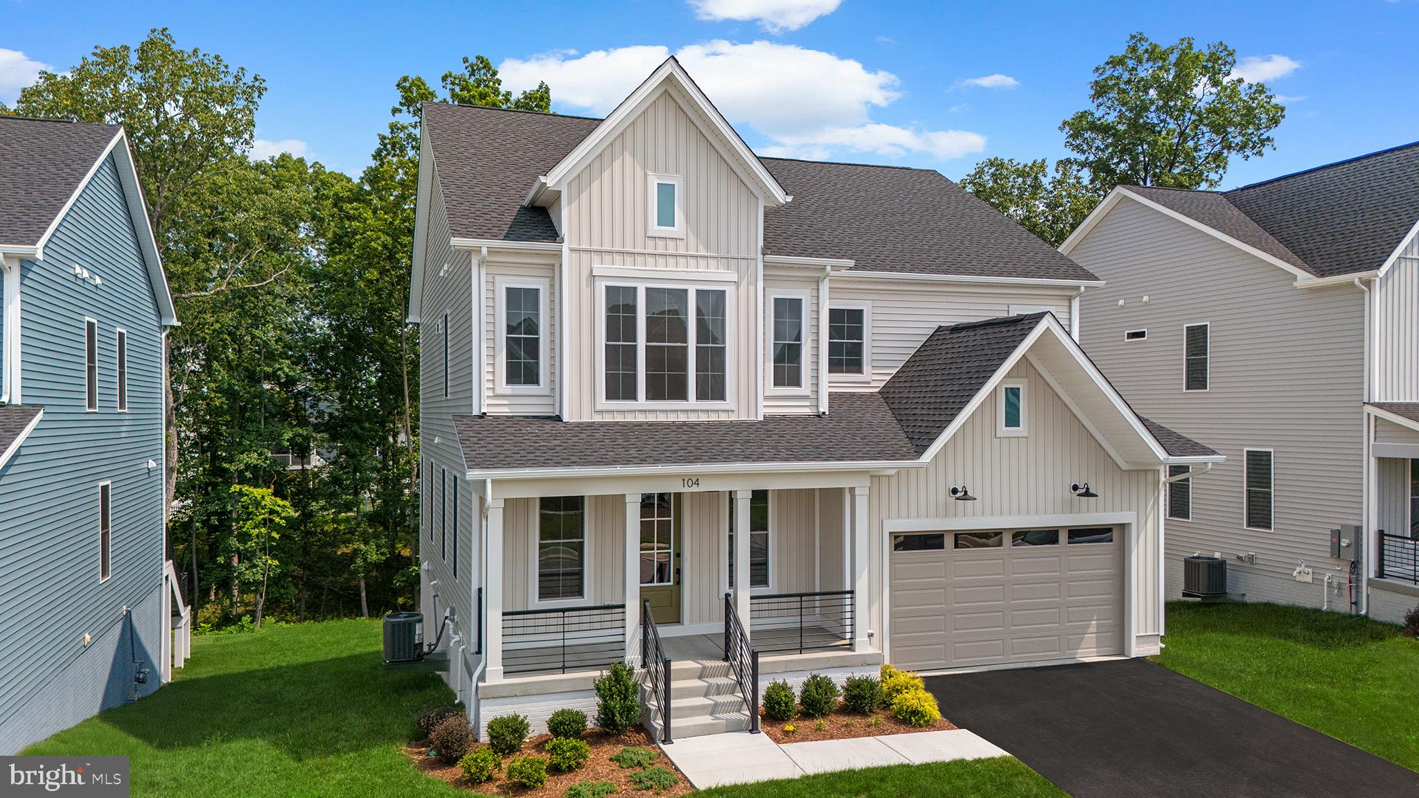 104 Alabaster Lane Stephenson, VA 22656 - Photo 3 of 48 a front view of a house with a yard