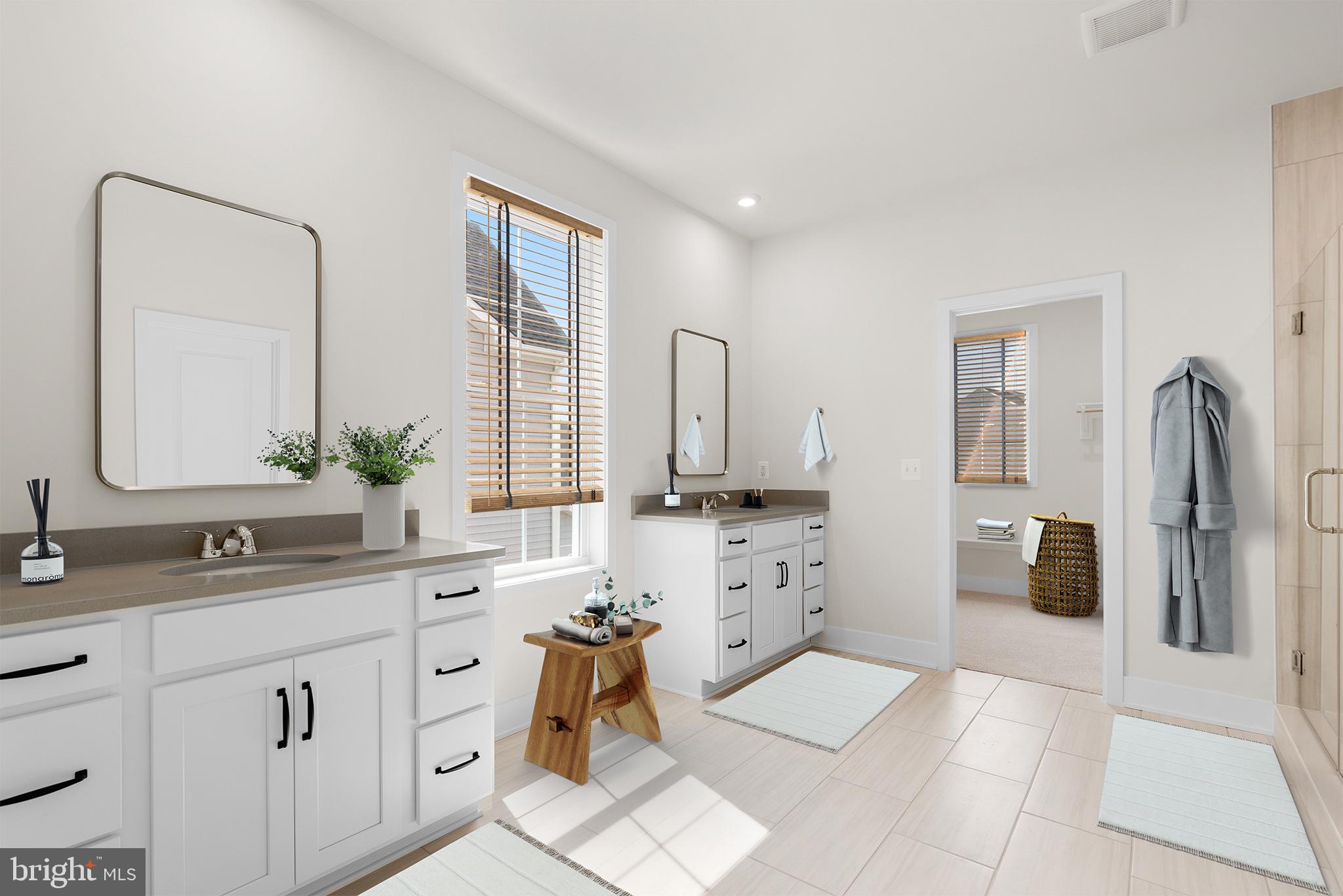 104 Alabaster Lane Stephenson, VA 22656 - Photo 8 of 48 a spacious bathroom with a double vanity sink mirror and