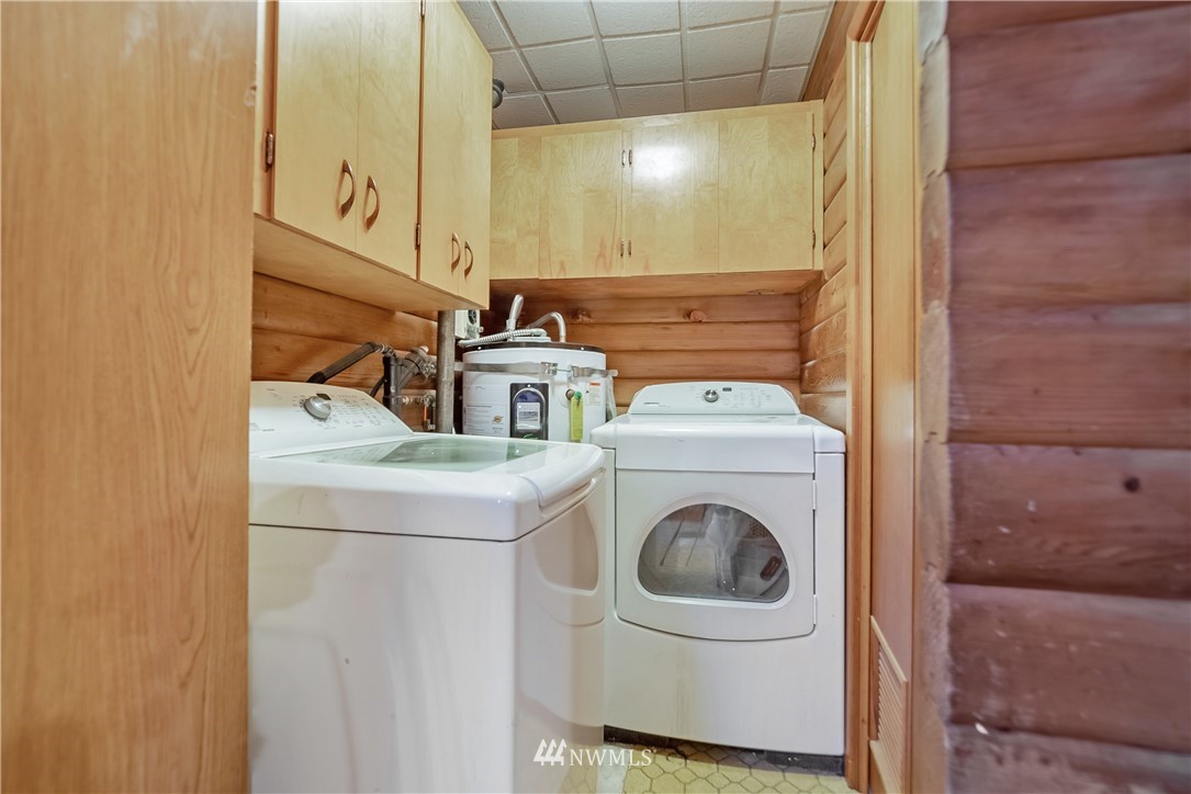 16407 Spanaway Loop Road South Spanaway, WA 98387 - Photo 8 of 20 a utility room with dryer and washer
