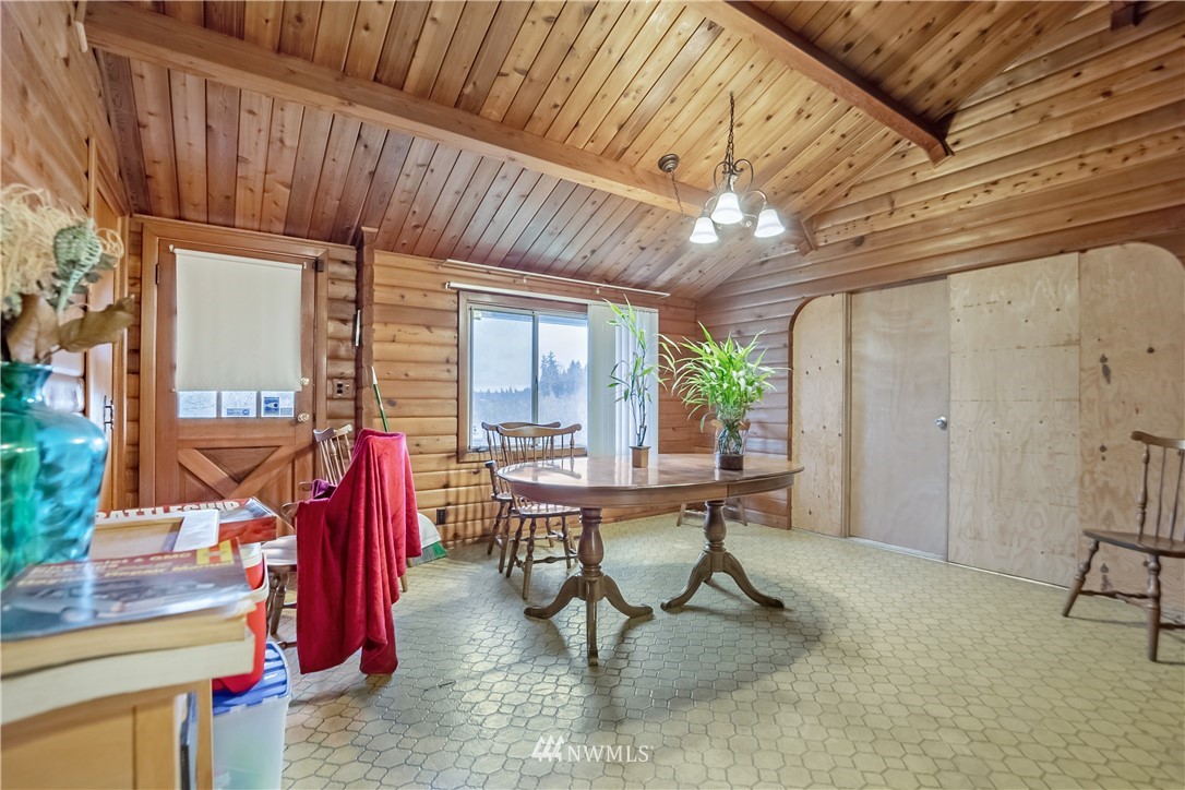16407 Spanaway Loop Road South Spanaway, WA 98387 - Photo 10 of 20 a view of a dining room with furniture window and outside view
