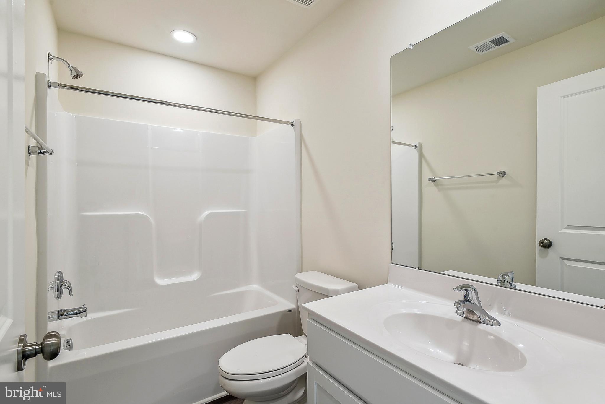 Ohio Avenue Earleville, MD 21919 - Photo 20 of 60 a bathroom with a sink toilet and shower