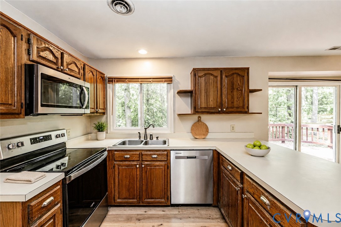 2806 Cove Ridge Road Midlothian, VA 23112 - Photo 4 of 52 Kitchen featuring wood cabinetry, stainless steel