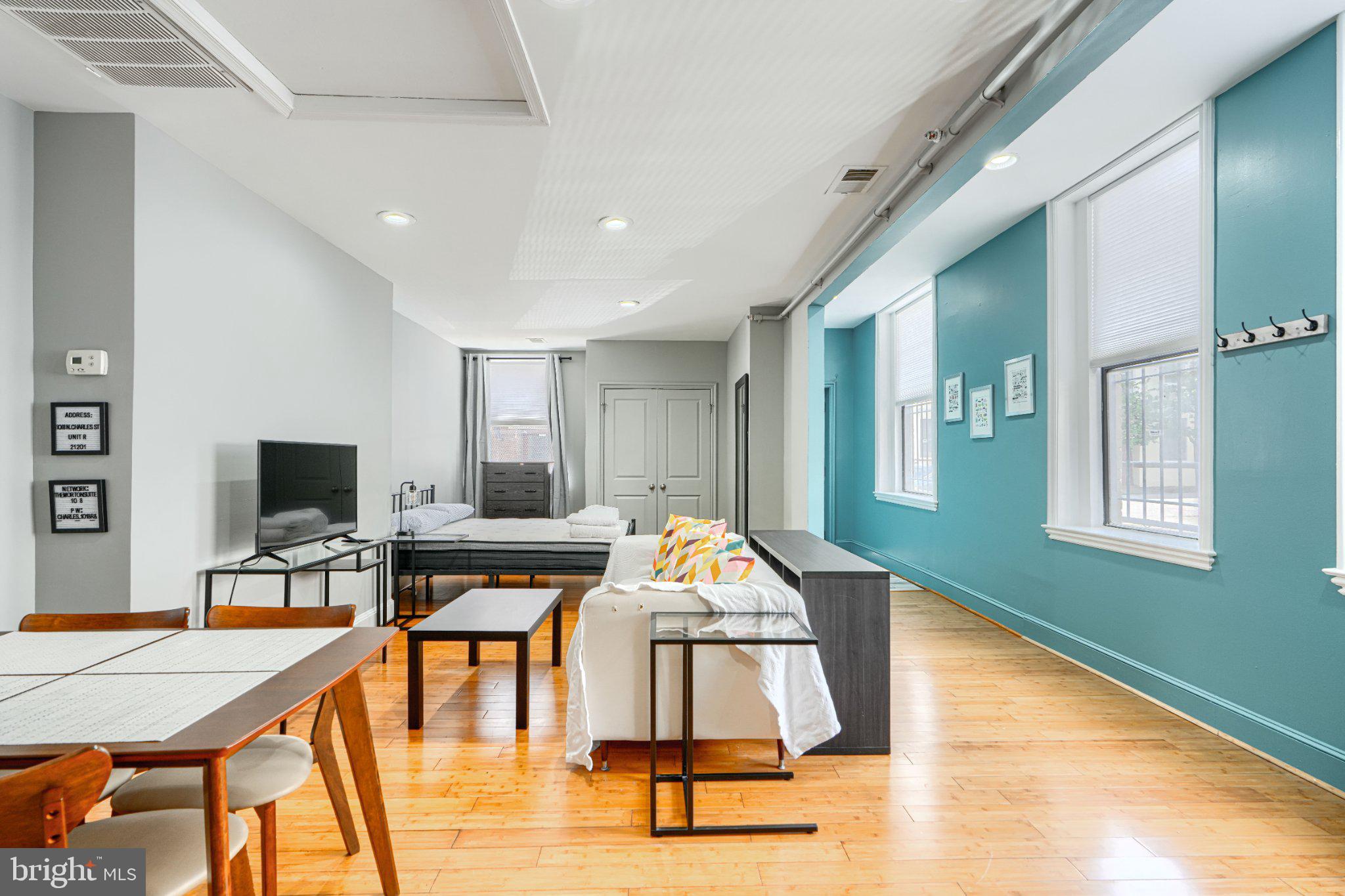 1018 North Charles Street, Unit R Baltimore, MD 21201 - Photo 5 of 17 Bright and airy open living space.