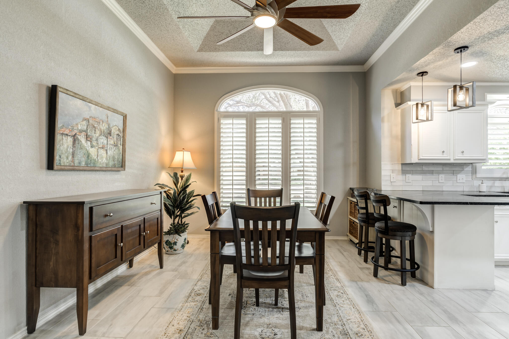 8204 Colton Avenue Lubbock, TX 79424 - Photo 5 of 19 a view of a dining room with furniture window and wooden floor