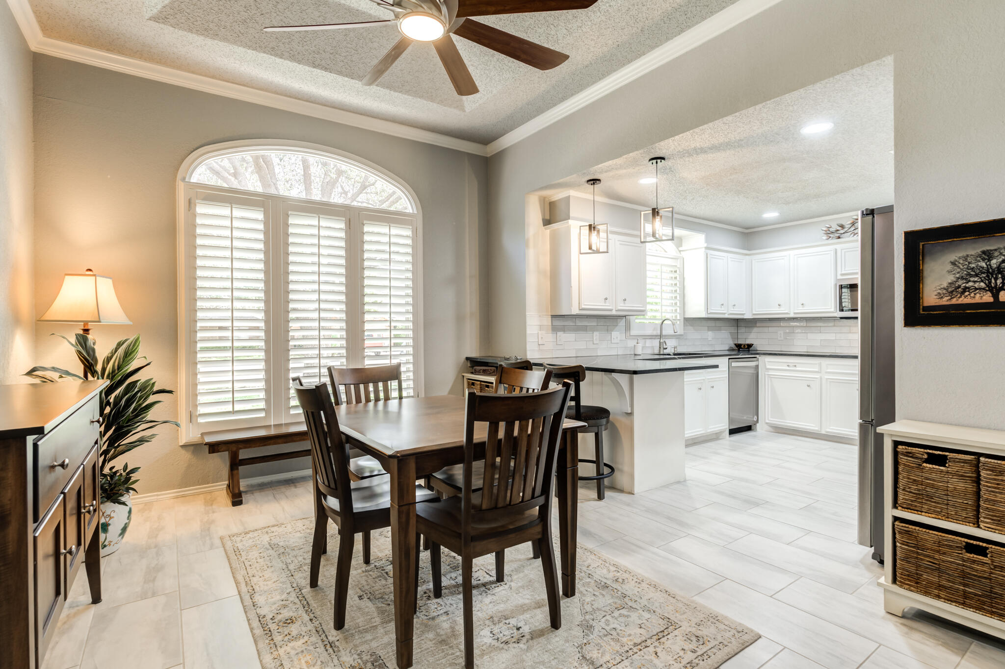 8204 Colton Avenue Lubbock, TX 79424 - Photo 6 of 19 a view of a dining room with furniture window and wooden floor