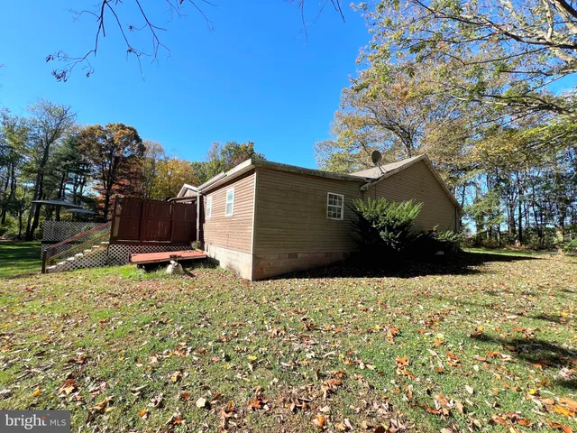 a front view of a house with yard