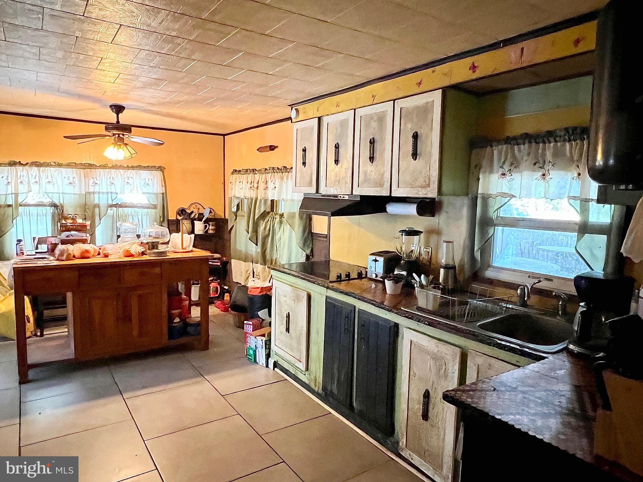511 Pine Drive Valley View, PA 17983 - Photo 15 of 22 a kitchen with a sink and a stove top oven