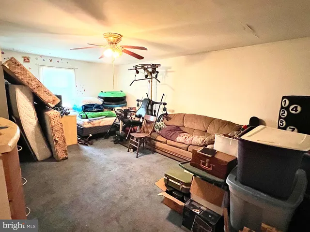 a room with furniture and a flat screen tv