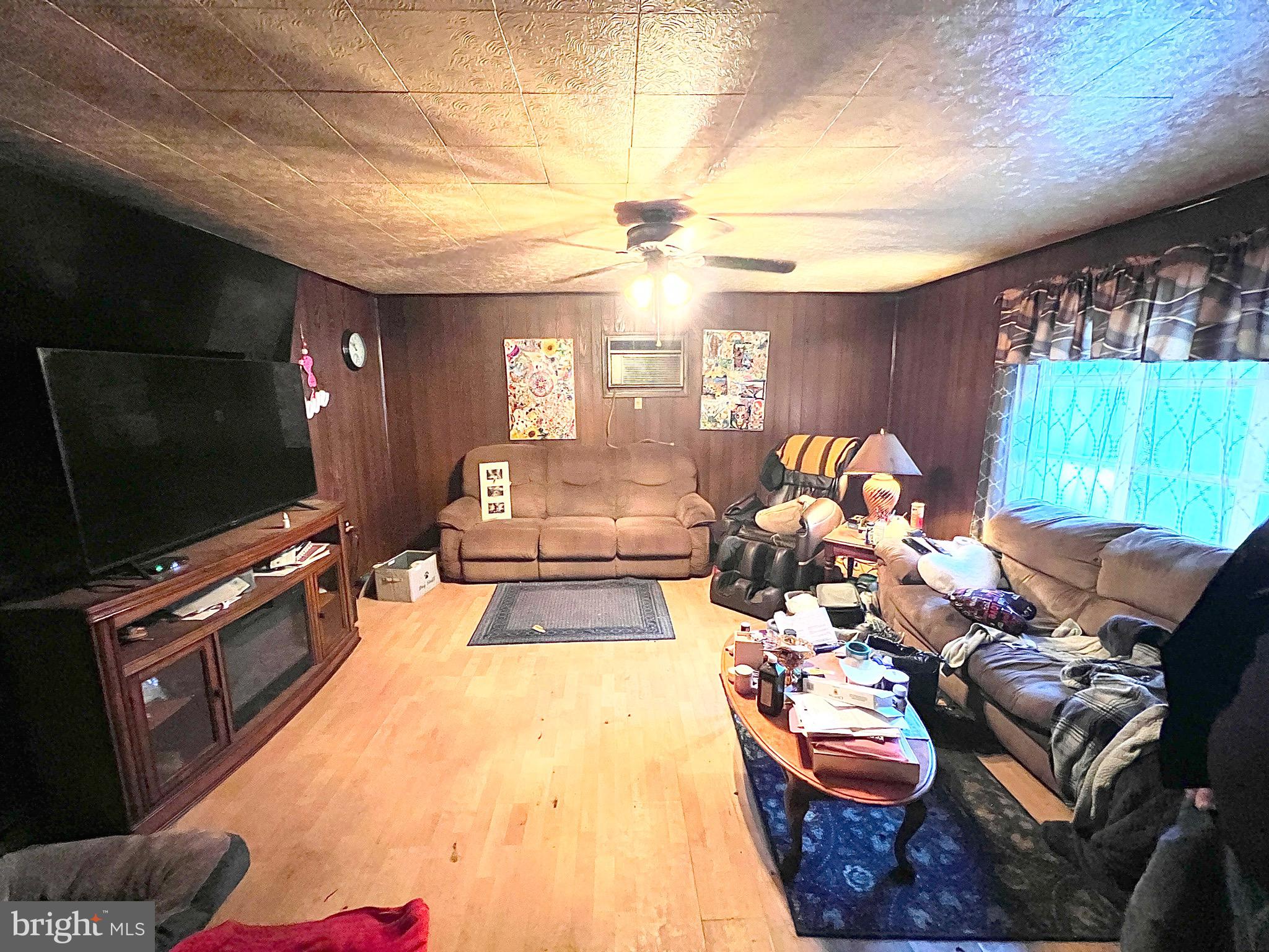 511 Pine Drive Valley View, PA 17983 - Photo 22 of 22 a living room with furniture and a flat screen tv