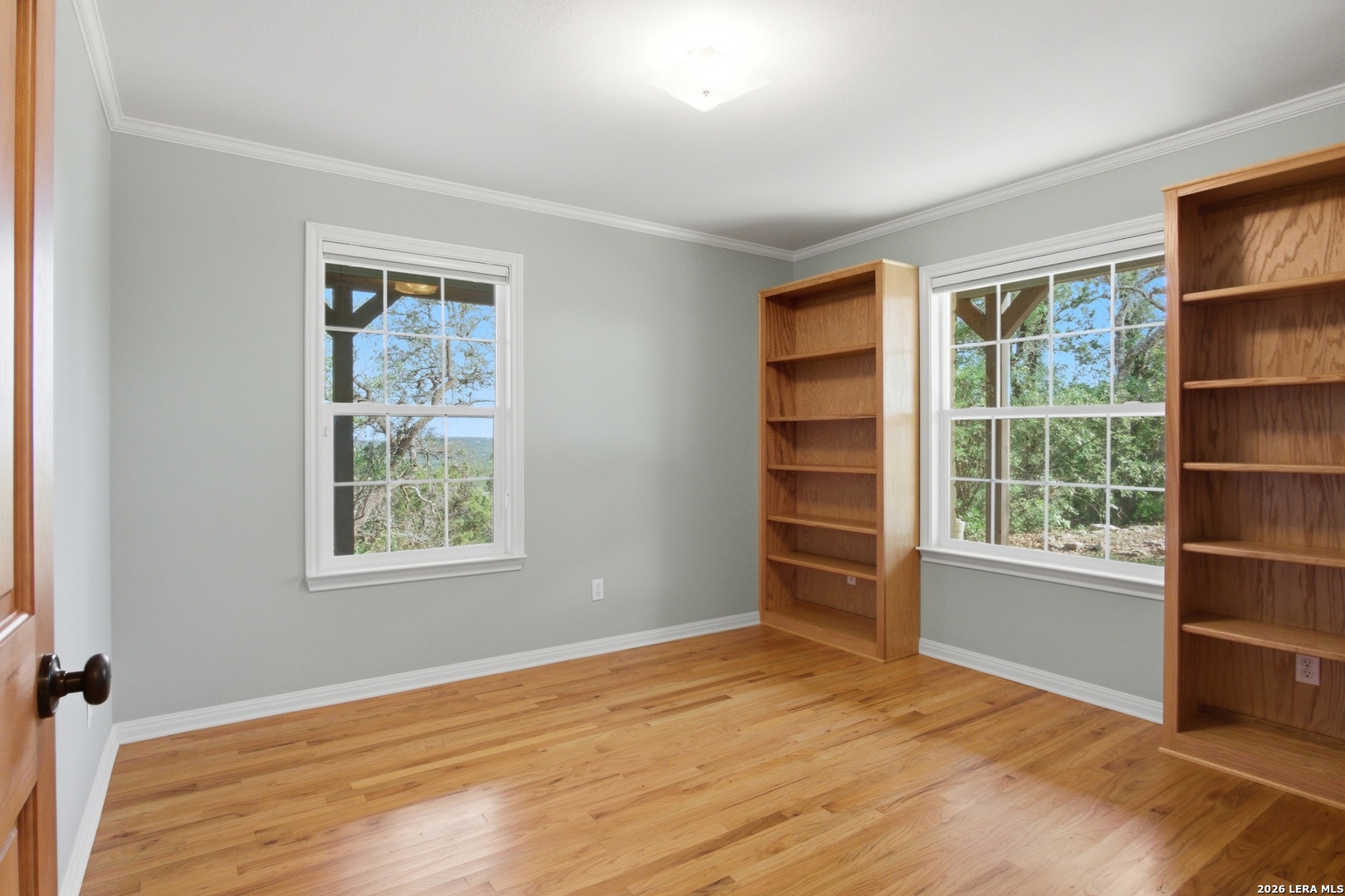 26 Seewald Road Boerne, TX 78006 - Photo 29 of 33 a view of an empty room with a window and wooden floor