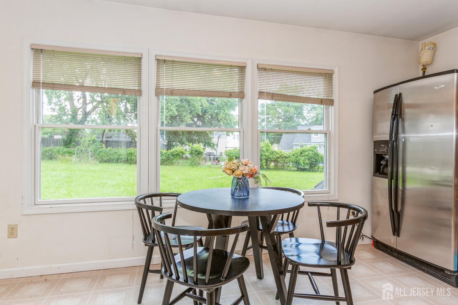8 Longfellow Drive Colonia, NJ 07067 - Photo 8 of 24 a dining room with furniture window and outside view
